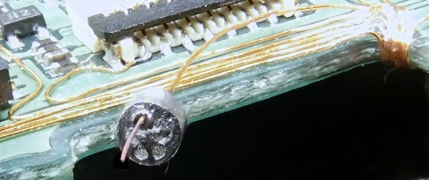 Scraped wire with piece of solder